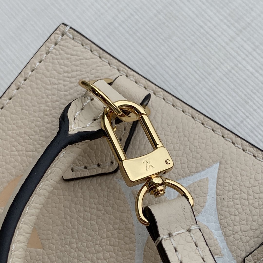 LV PETIT SAC PLAT CREAM MONOGRAM EMPREINTE COWHIDE LEATHER