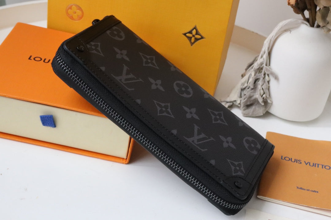 TRUNK ZIPPY WALLET 19.5 BLACK MONOGRAM CANVAS