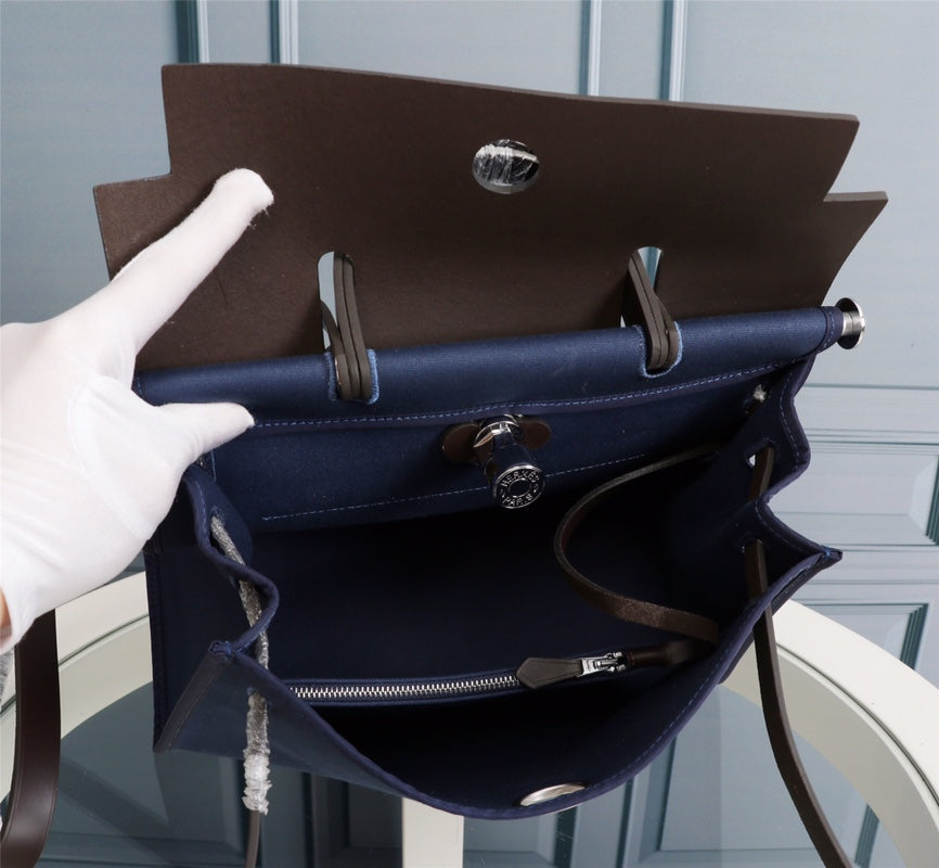 HM HERBAG ZIP 31 NAVY AND CHOCOLATE CANVAS