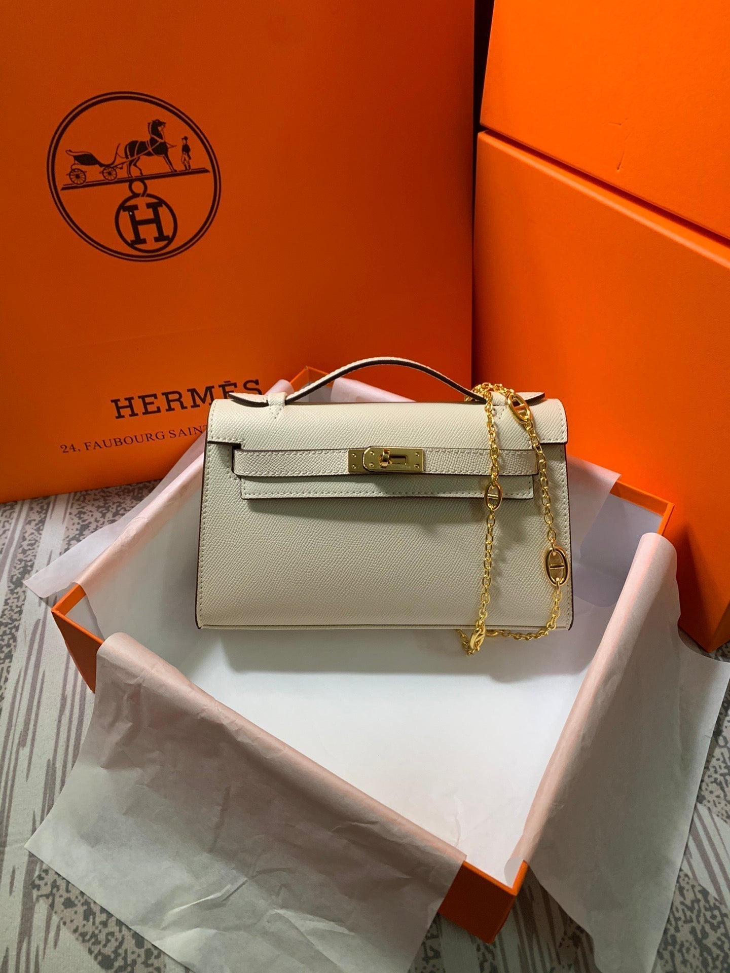 HM KELLY MINI POCHETTE 22 CREAM CALFSKIN