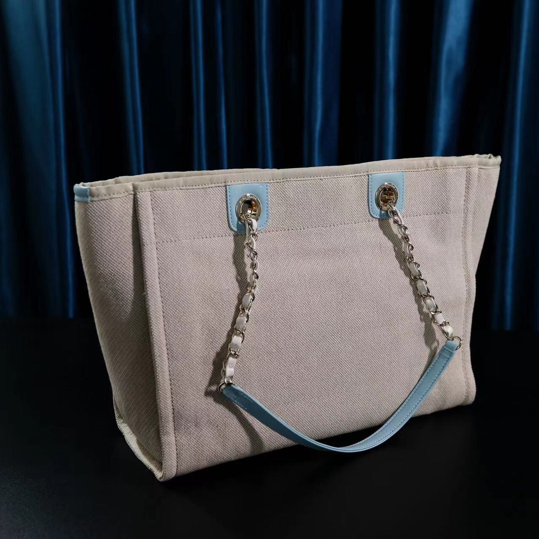 CC DEAUVILLE LARGE 39 TOTE BAG IN BEIGE CANVAS WITH LIGHT BLUE CHAIN