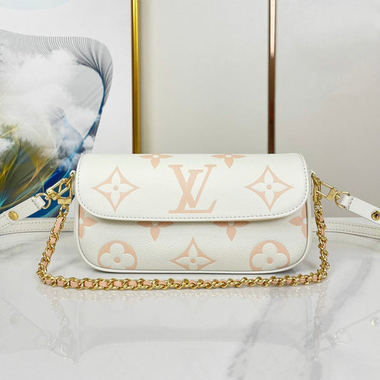 WALLET ON CHAIN IVY 23 IN WHITE PINK MONOGRAM EMPREINTE LEATHER