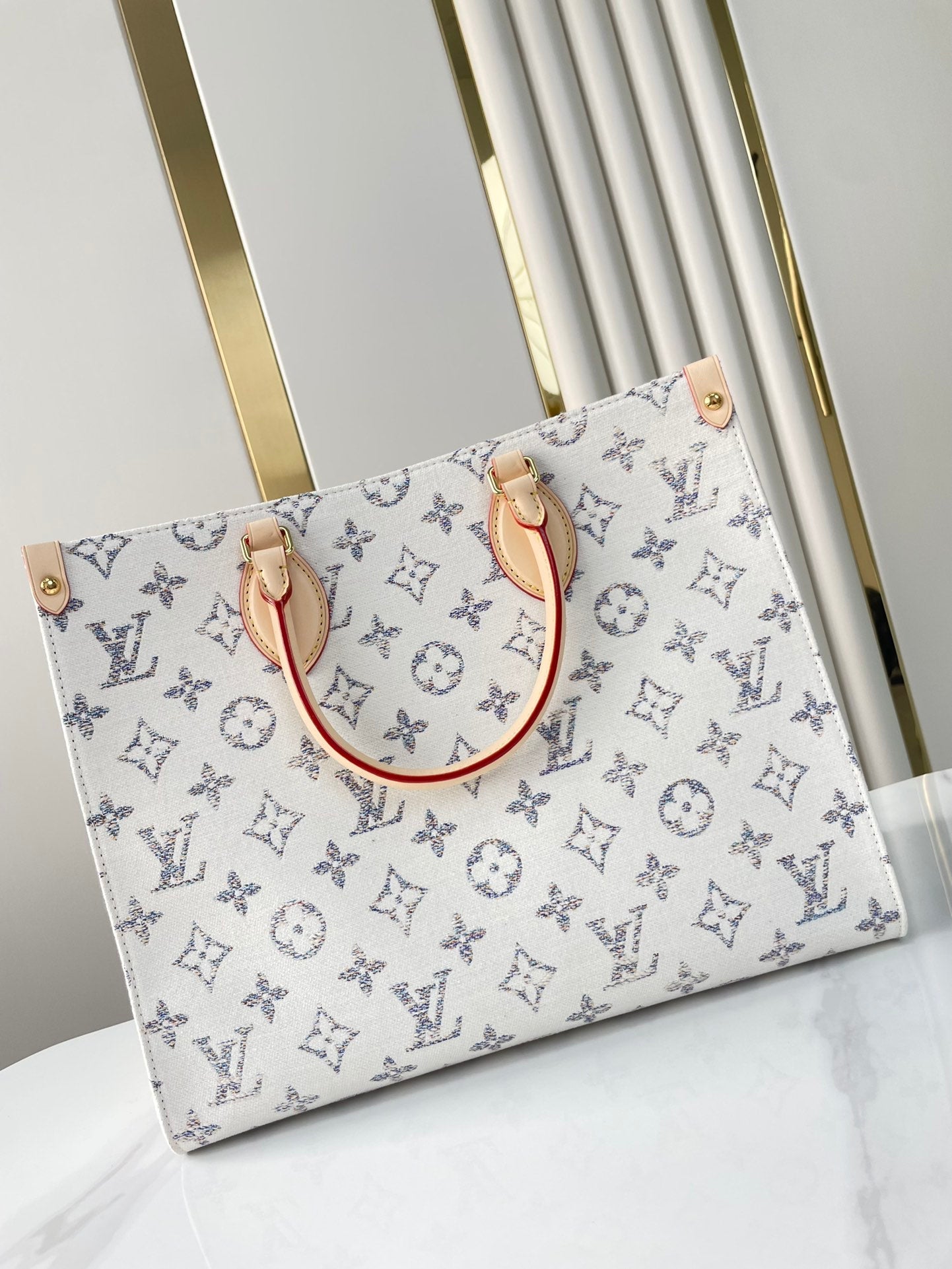 ONTHEGO MM 35 IN WHITE MONOGRAM JACQUARD FABRIC