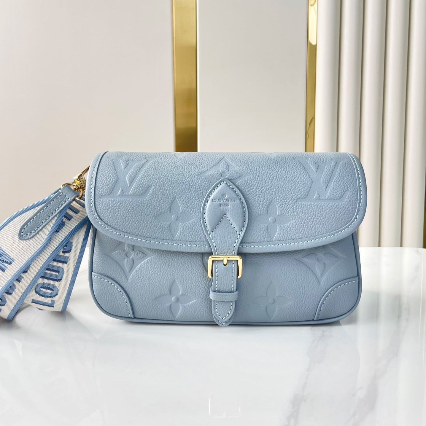 DIANE 23 IN BEAU BLUE MONOGRAM EMPREINTE LEATHER