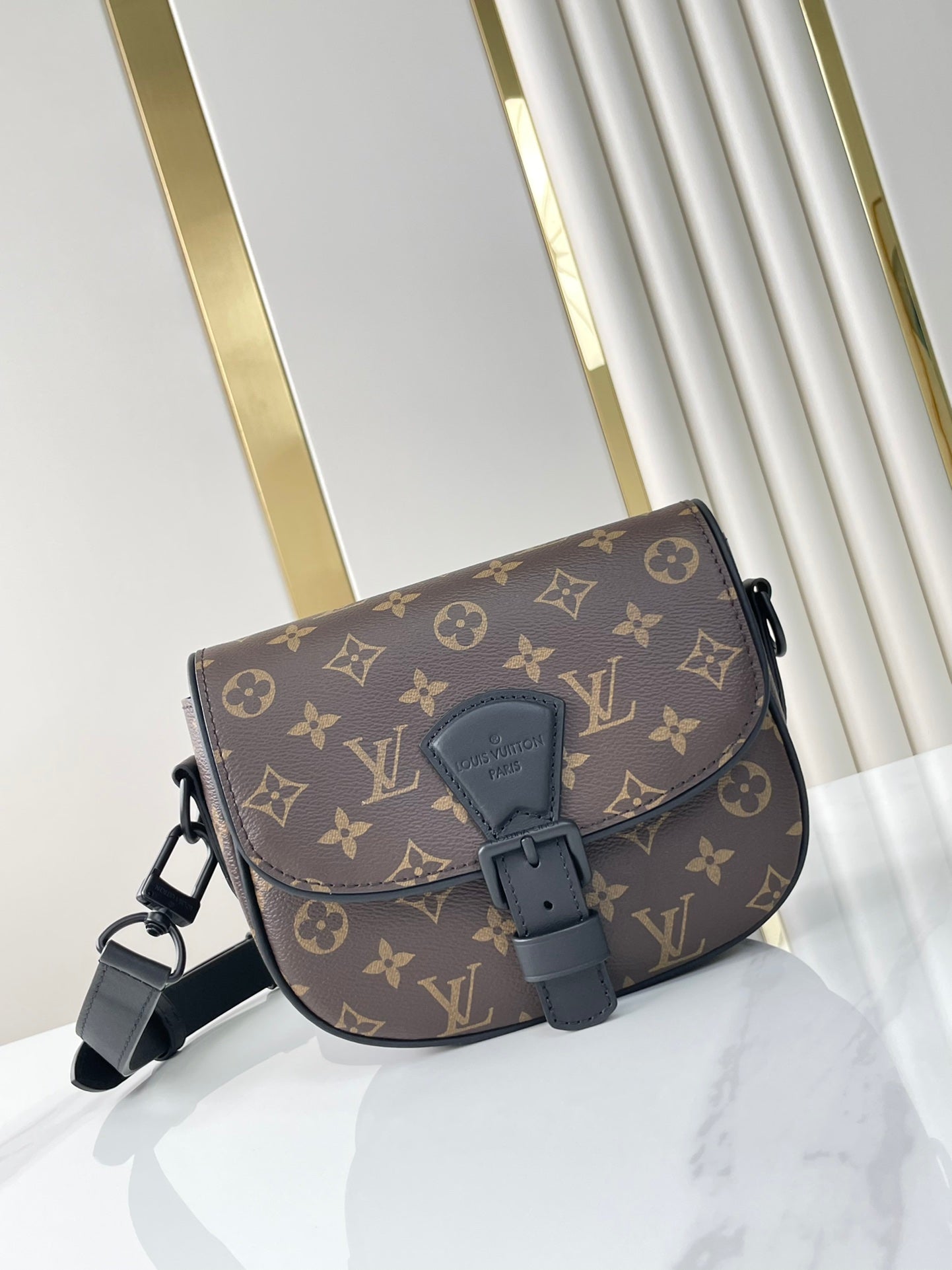 MONTSOURIS MESSENGER PM 20 IN BROWN MONOGRAM CANVAS