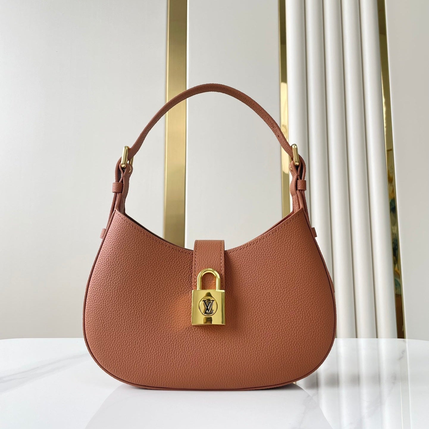 LOW KEY SHOULDER BAG 26 IN COGNAC GRAINED CALFSKIN GOLD BUCKLE