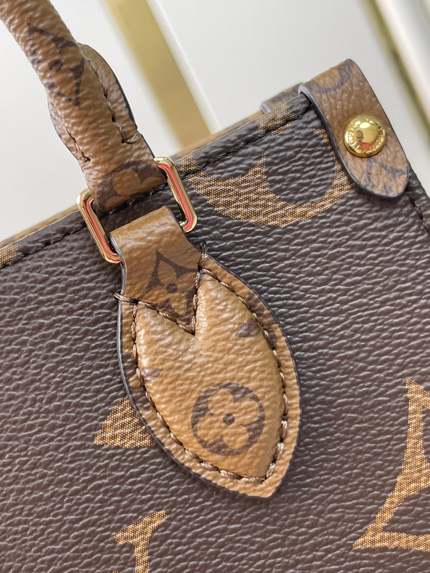 ONTHEGO BB 18 IN BROWN MONOGRAM AND MONOGRAM REVERSE CANVAS