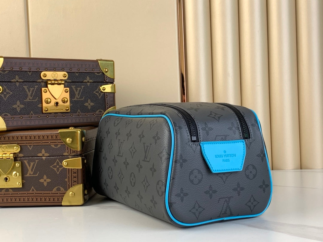 DOPP KIT 28 IN GUN METAL MONOGRAM ECLIPSE CANVAS AND TURQUOISE CALFSKIN TRIM