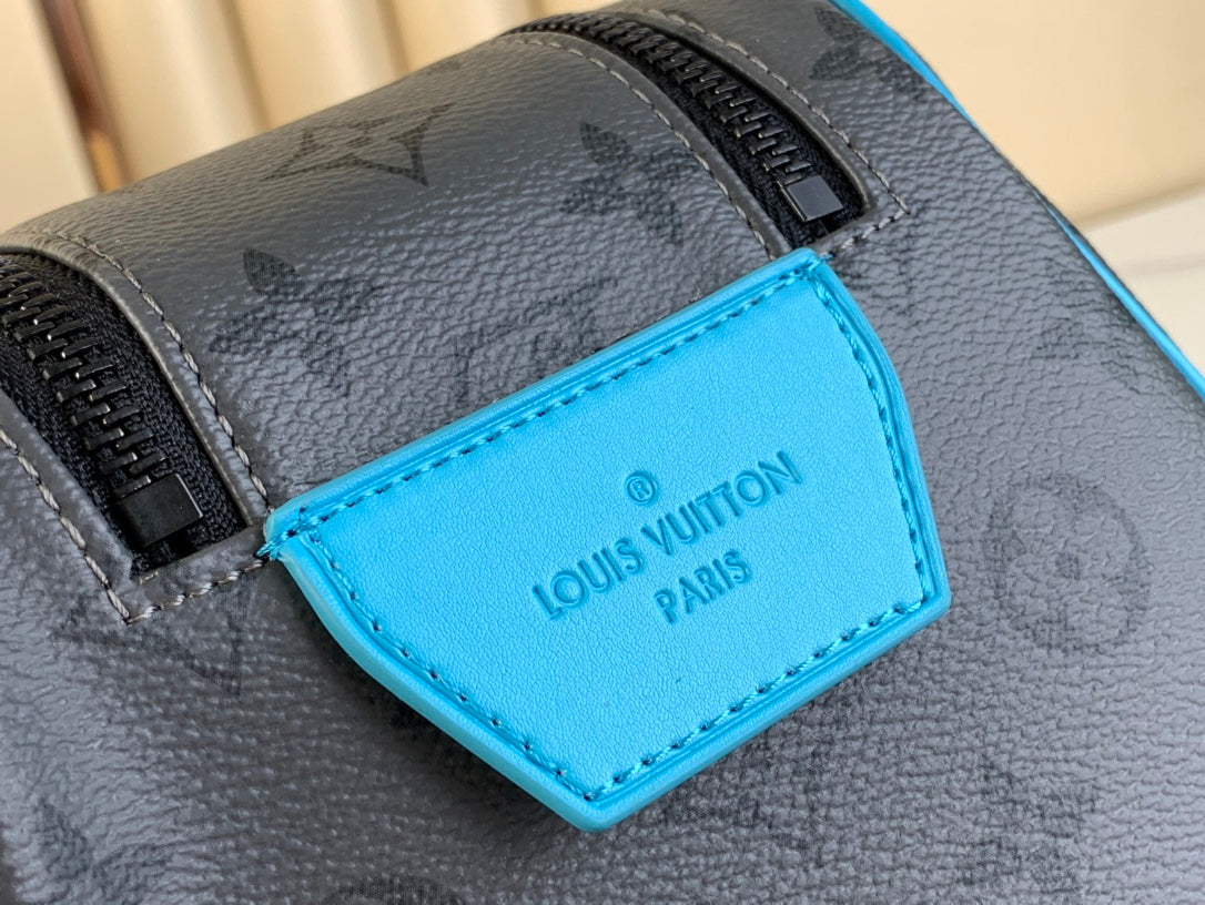 DOPP KIT 28 IN GUN METAL MONOGRAM ECLIPSE CANVAS AND TURQUOISE CALFSKIN TRIM