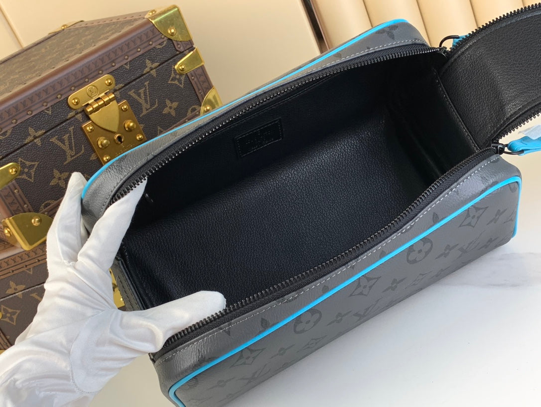 DOPP KIT 28 IN GUN METAL MONOGRAM ECLIPSE CANVAS AND TURQUOISE CALFSKIN TRIM