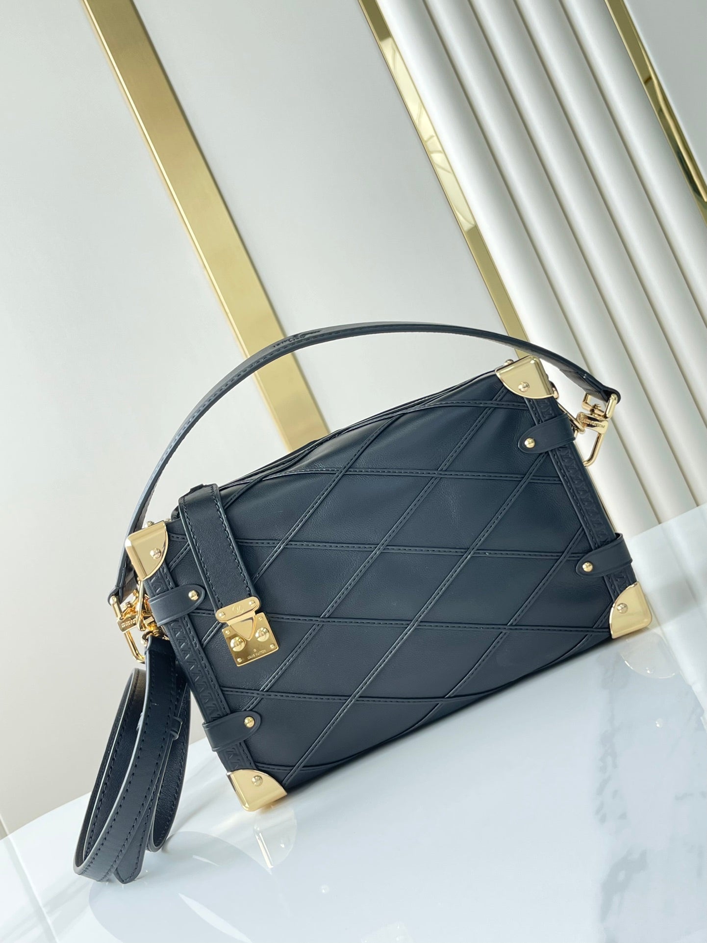 SIDE TRUNK 21 IN BLACK LAMBSKIN WITH CRISS CROSS PATTERN GOLD HARDWARE