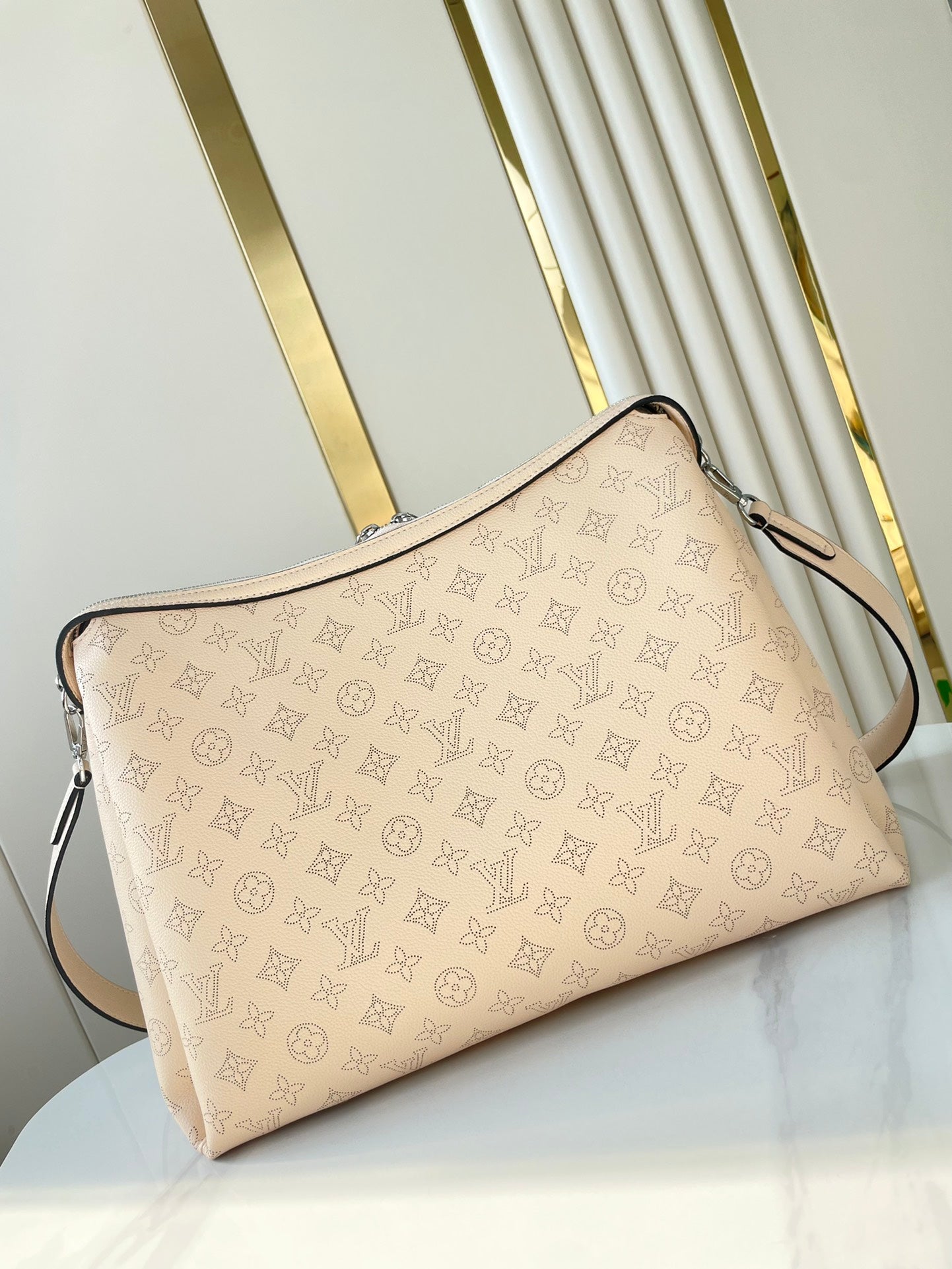 HAND IT ALL MM 32 IN CREAM MONOGRAM PERFORATE CALFSKIN SILVER HARDWARE