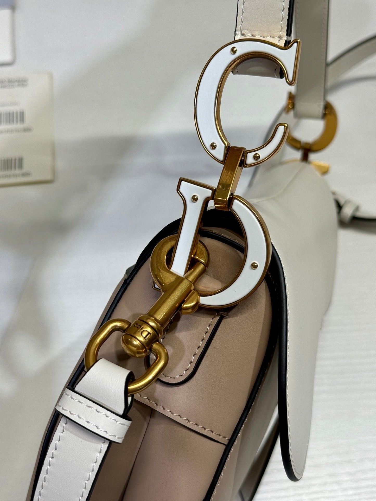 SADDLE BAG 25 WITH STRAP LATTE WHITE MIX MEDIUM BROWN GRAINED CALFSKIN