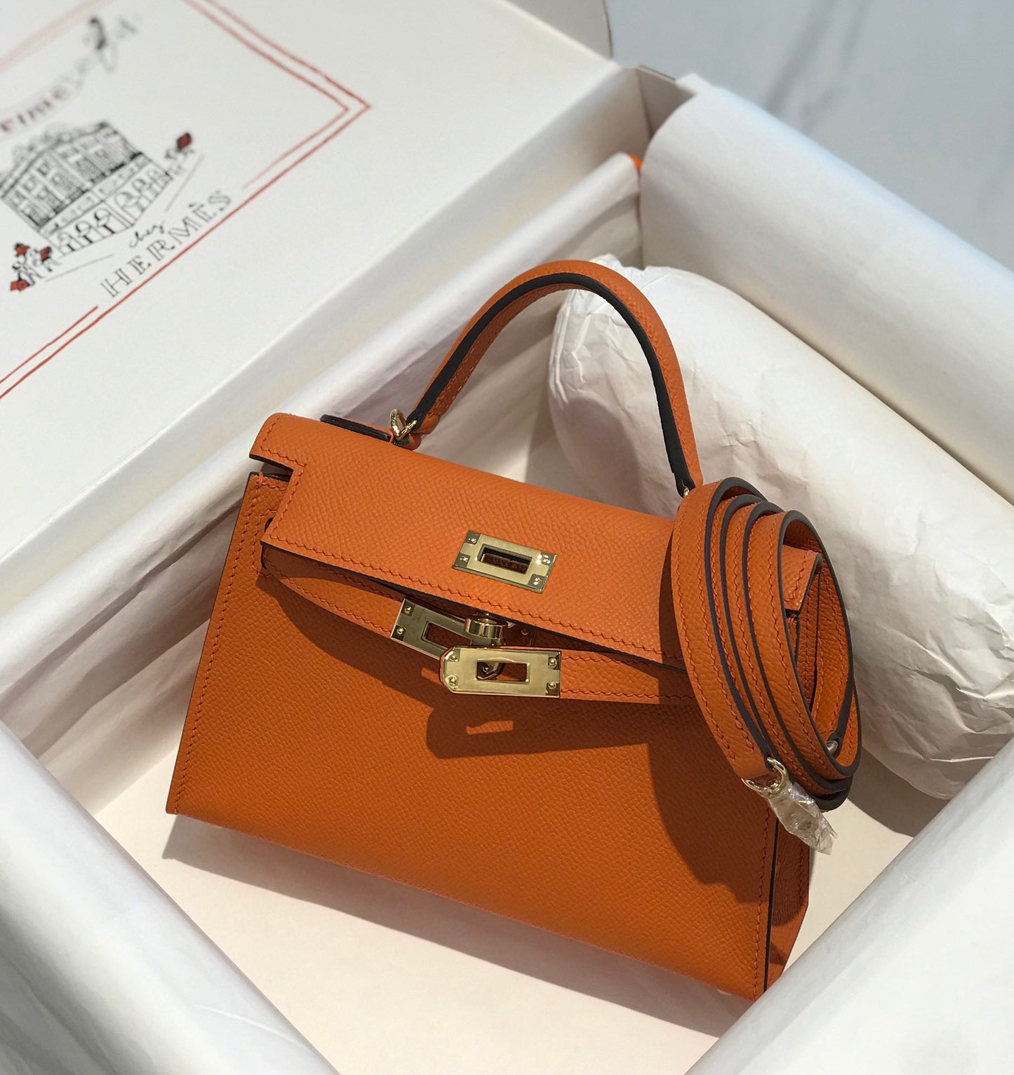 HM KELLY MINI 20 ORANGE EPSOM GOLD HARDWARE