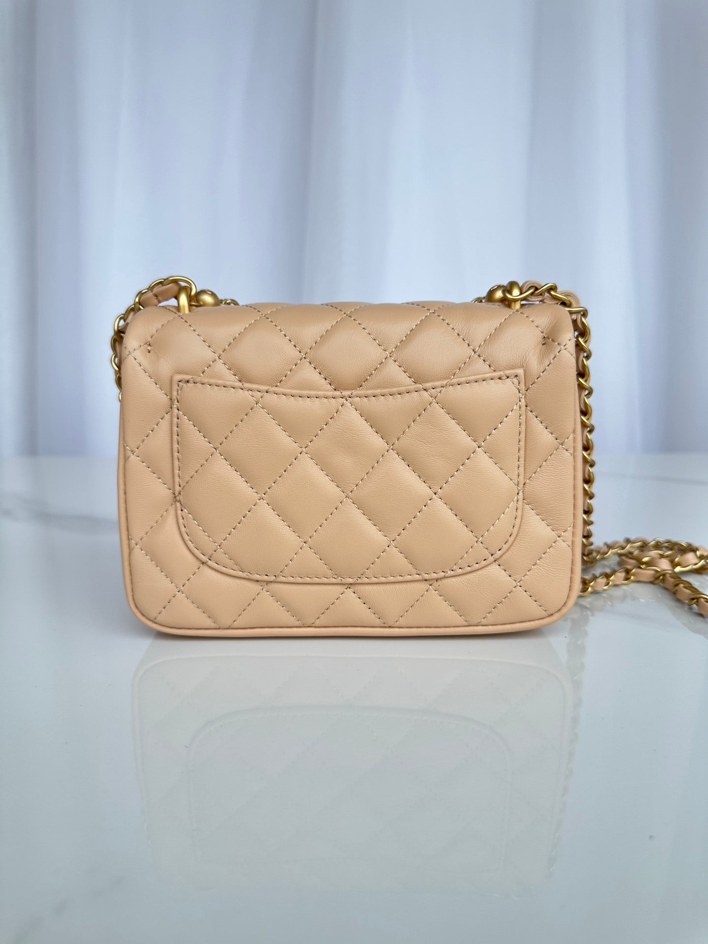 CC MINI 18 FLAP BAG IN BUFF CREAM CALFSKIN