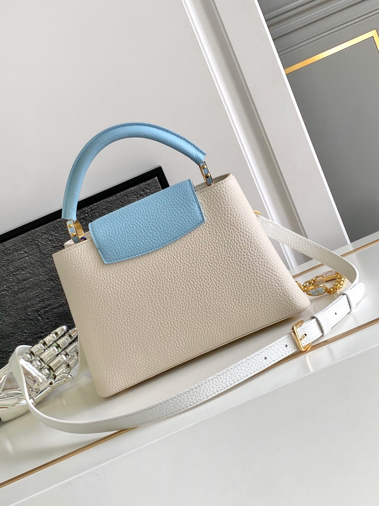 CAPUCINES BB 27 IN PEARL WHITE MIX SKY BLUE TAURILLON GOLD HARDWARE