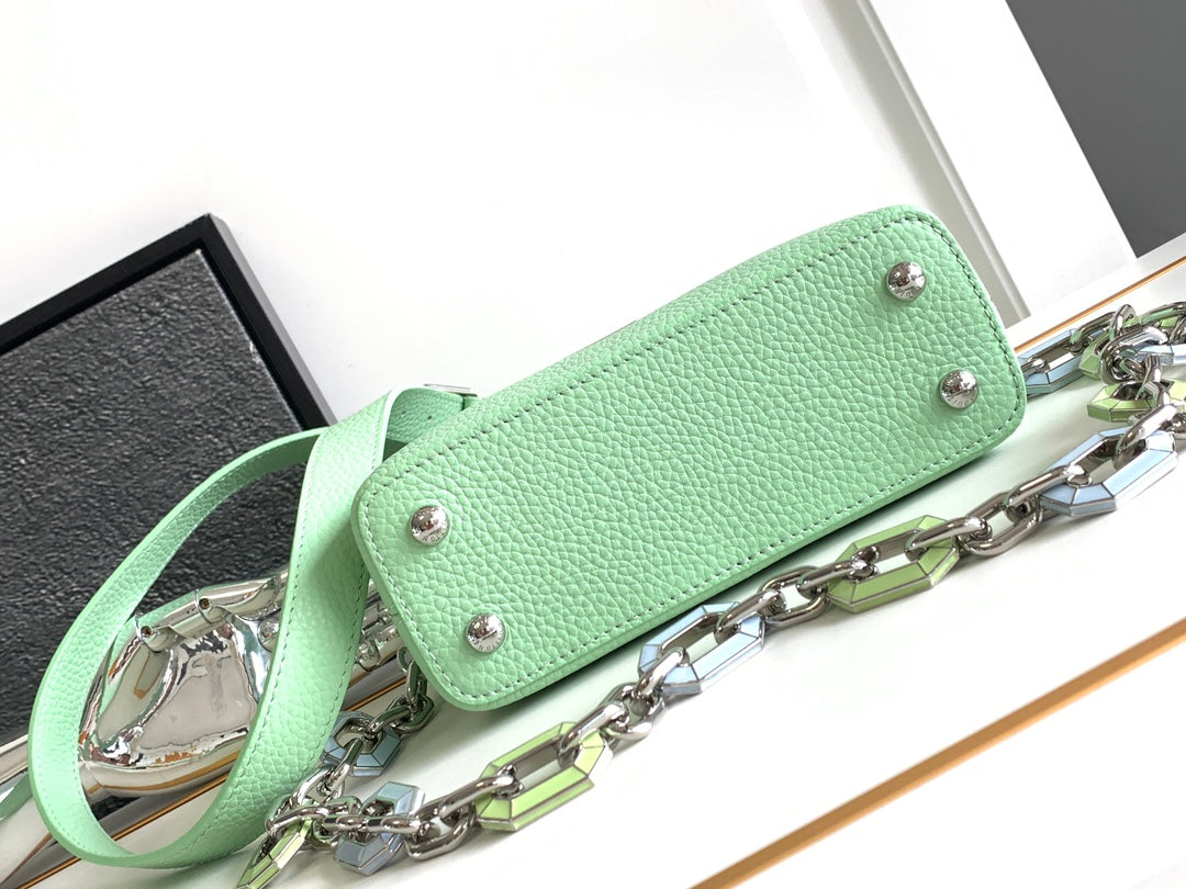 CAPUCINES MINI 21 IN LIGHT GREEN TAURILLON SILVER HARDWARE