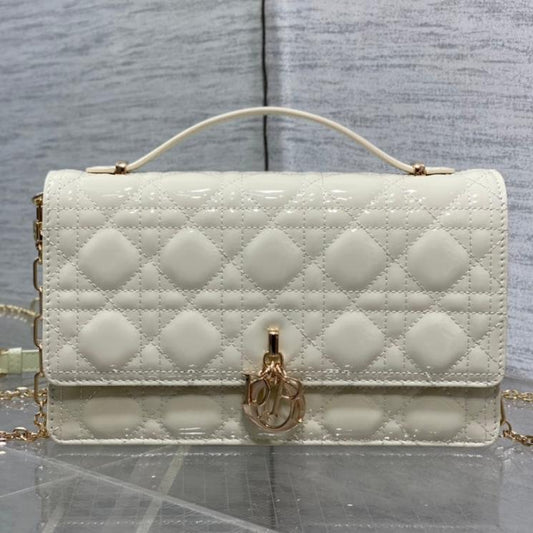 MINI BAG 24 IN WHITE CREAM PATENT CANNAGE CALFSKIN