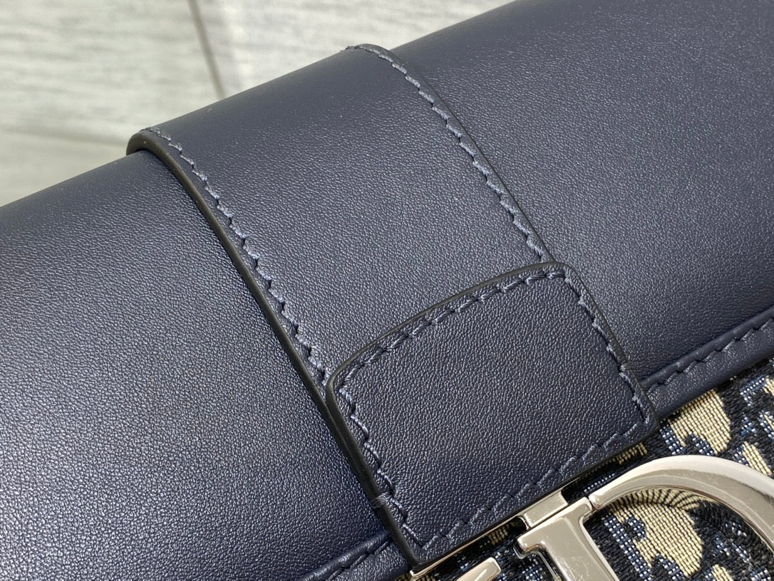 MONTAIGNE EAST-WEST 25 BAG WITH CHAIN IN NAVY BLUE LAMBSKIN AND MONOGRAM JACQUARD