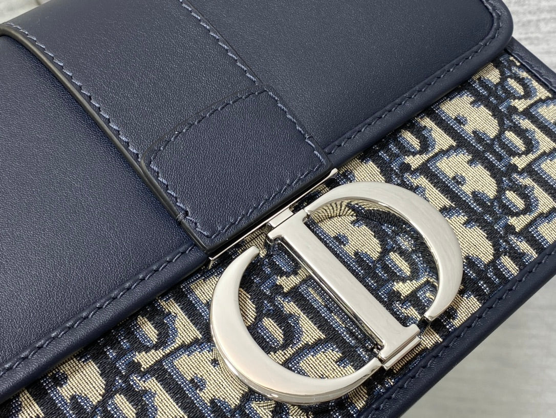 MONTAIGNE EAST-WEST 24 BAG WITH CHAIN IN NAVY BLUE LAMBSKIN AND MONOGRAM JACQUARD