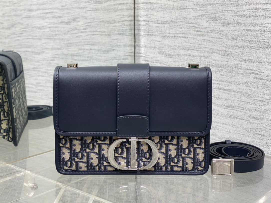 MONTAIGNE EAST-WEST 24 BAG WITH CHAIN IN NAVY BLUE LAMBSKIN AND MONOGRAM JACQUARD