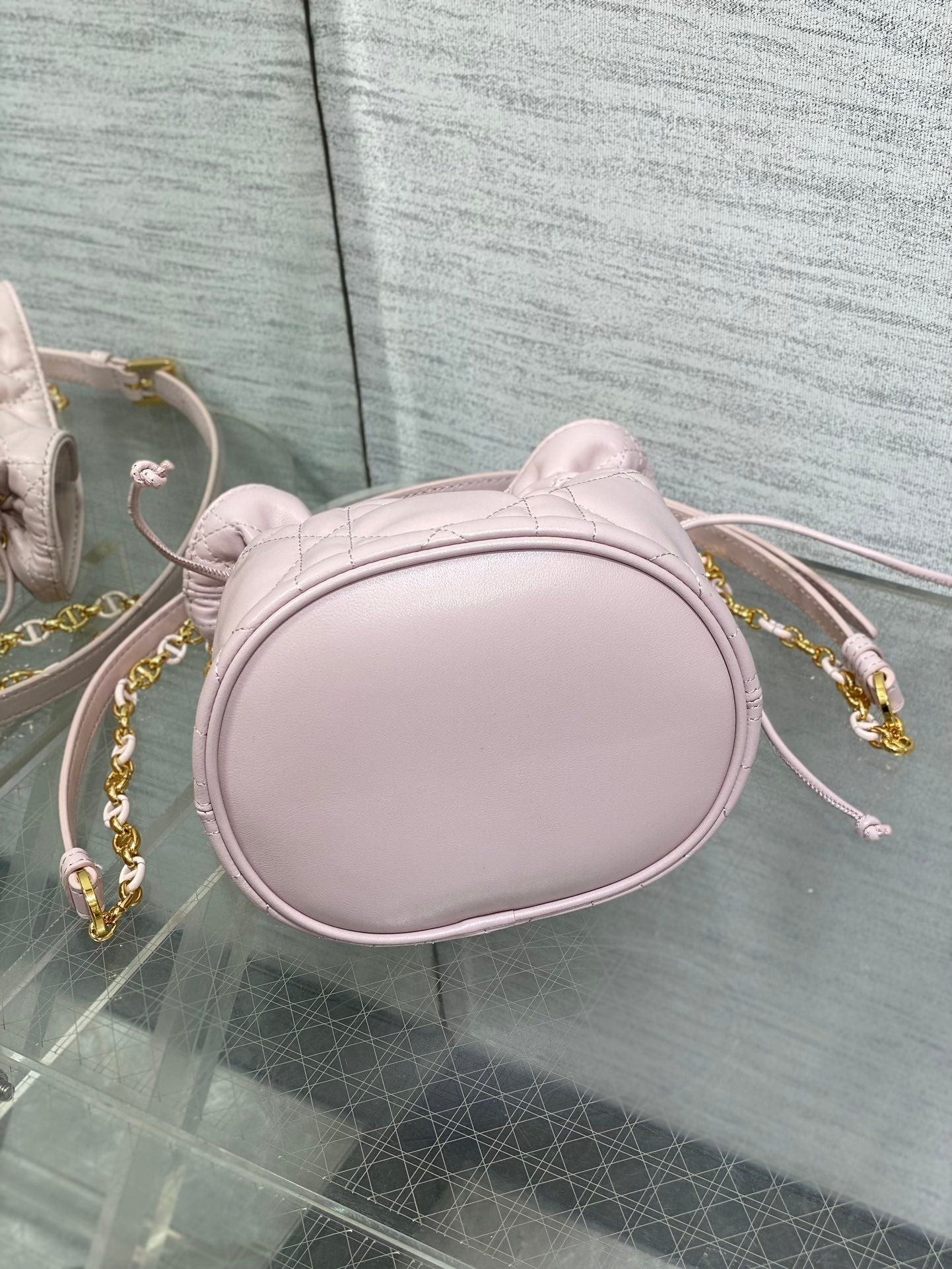 MONTAIGNE MINI 18 BUCKET BAG WITH DRAWSTRING IN BABY PINK LAMBSKIN