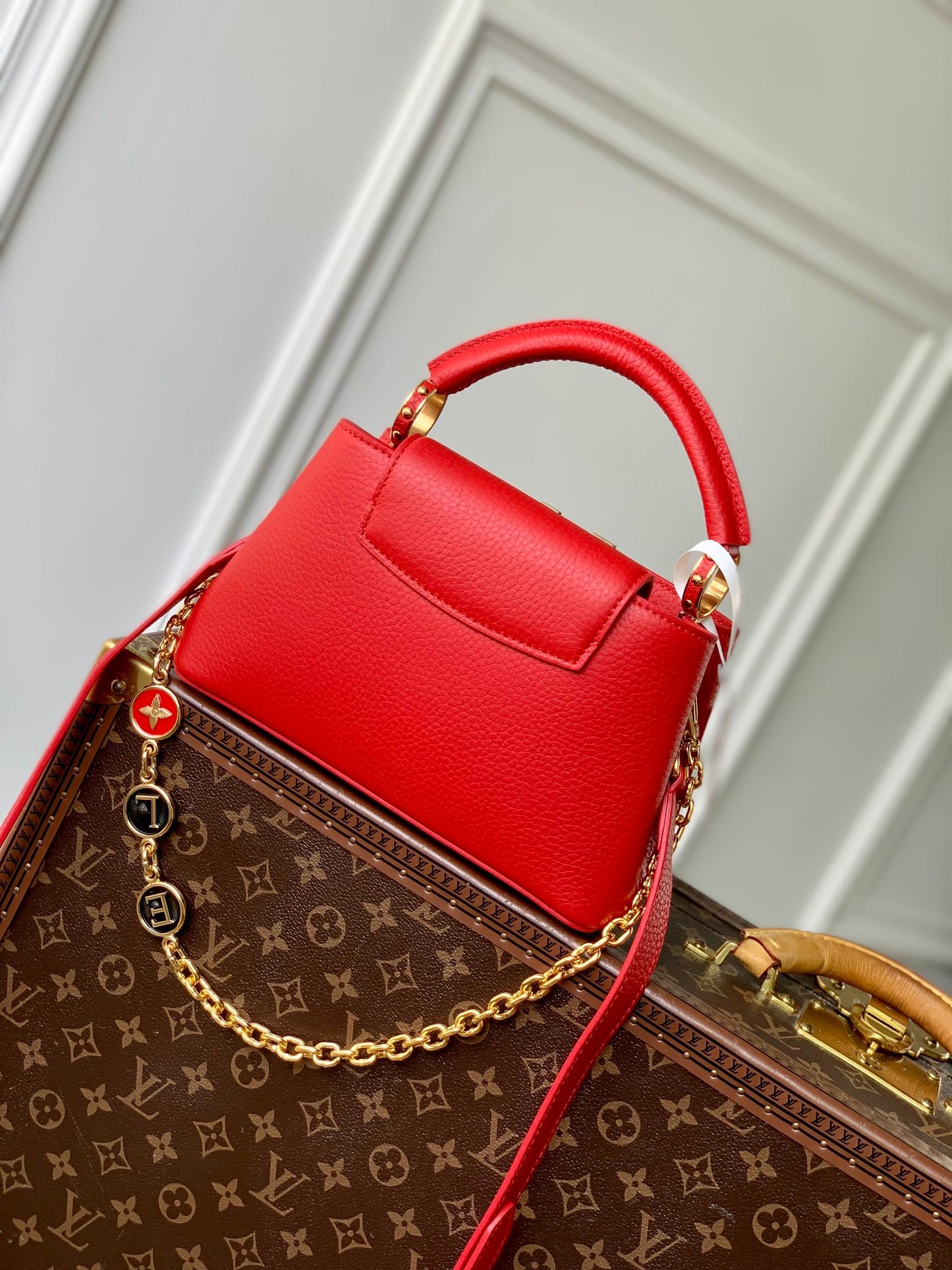 CAPUCINES MINI 23 IN RED TAURILLON GOLD HARDWARE