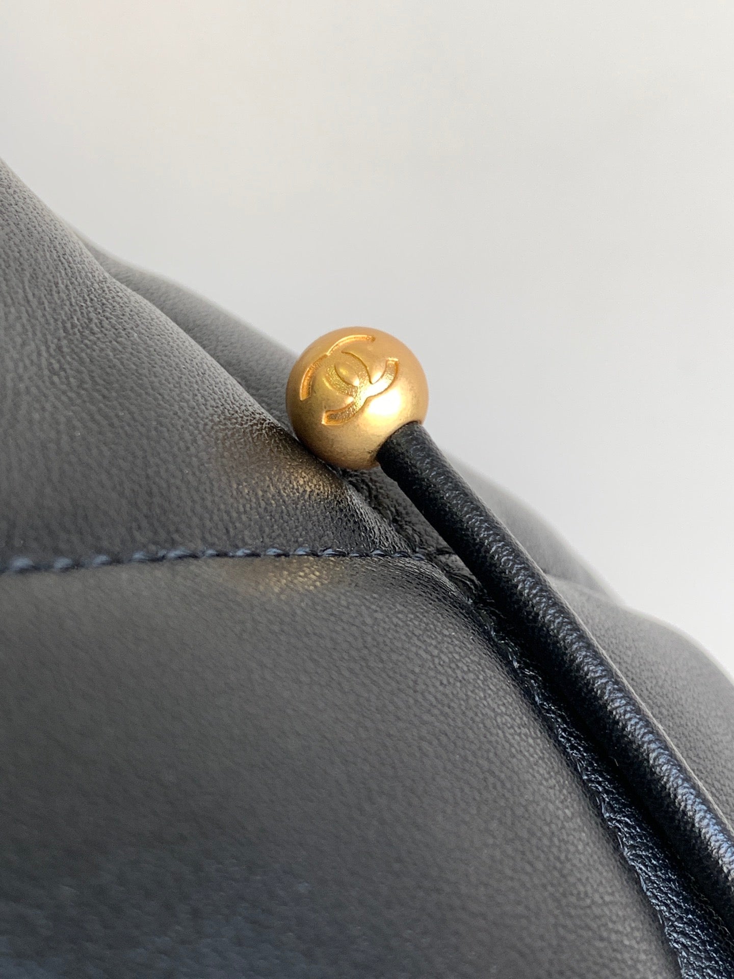 CC BACKPACK 26 IN BLACK CALFSKIN WITH GOLD HARDWARE