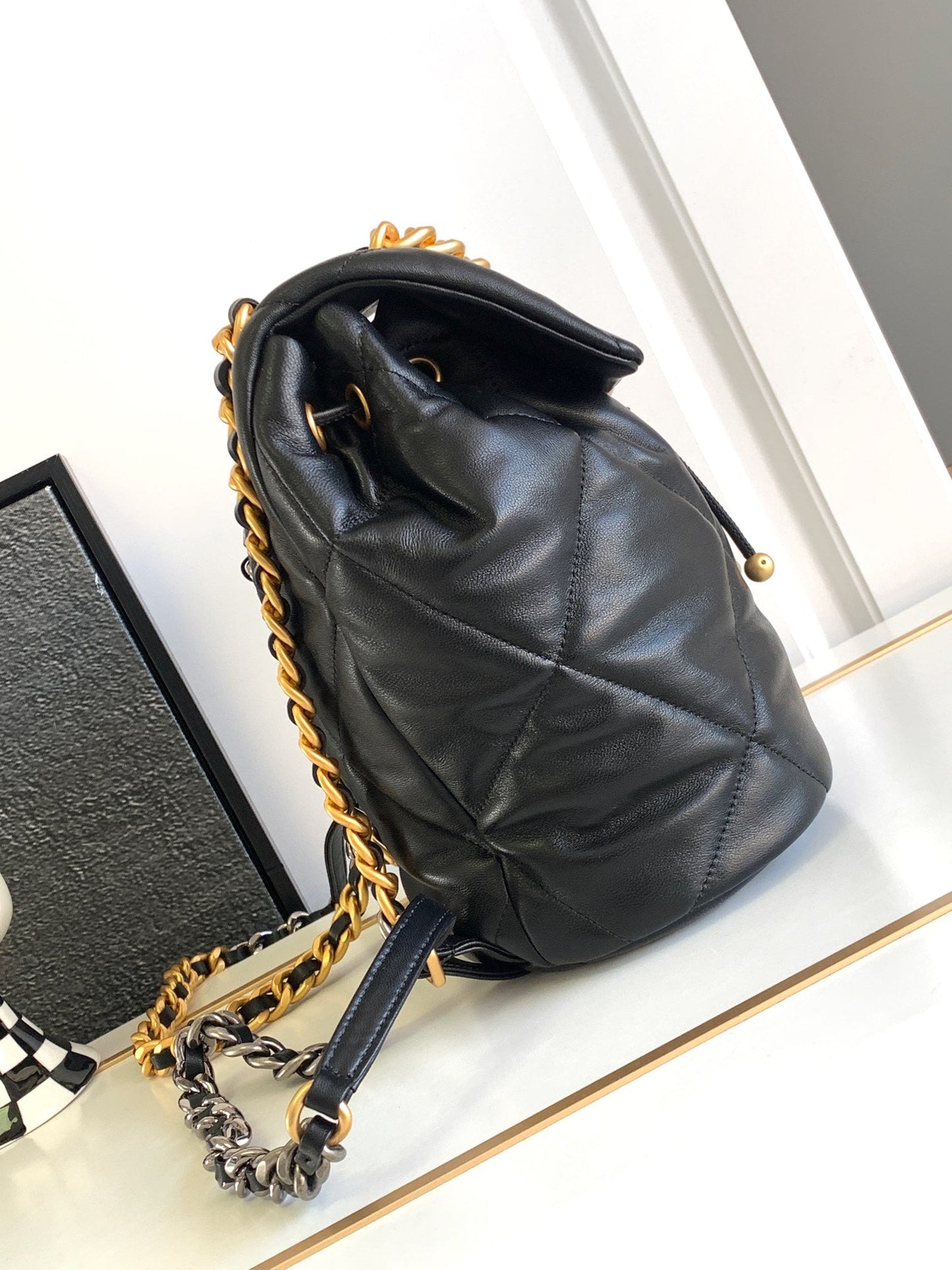 CC BACKPACK 26 IN BLACK CALFSKIN WITH GOLD HARDWARE