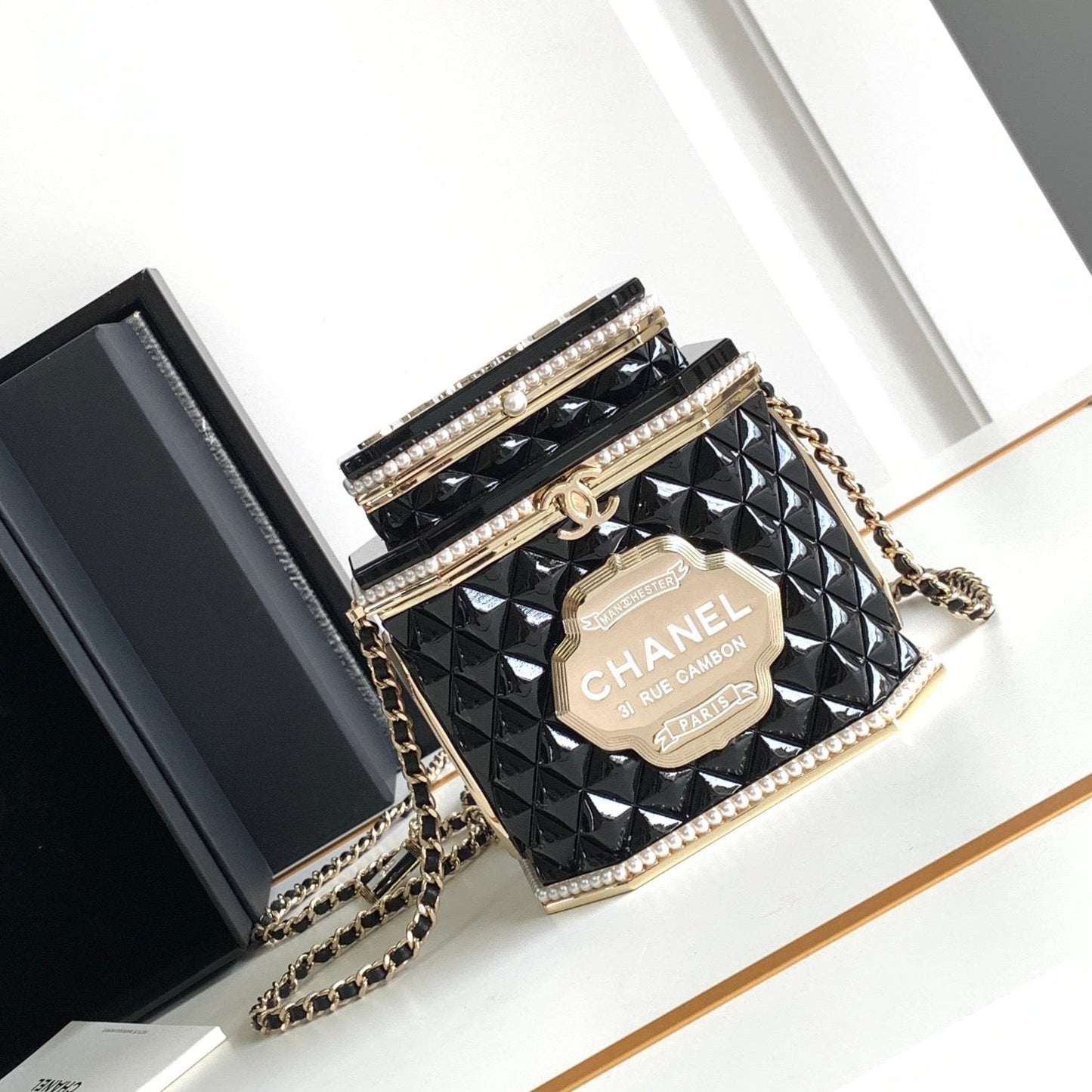 CC 12 TEA BOX MINAUDIERE BAG IN BLACK RESIN