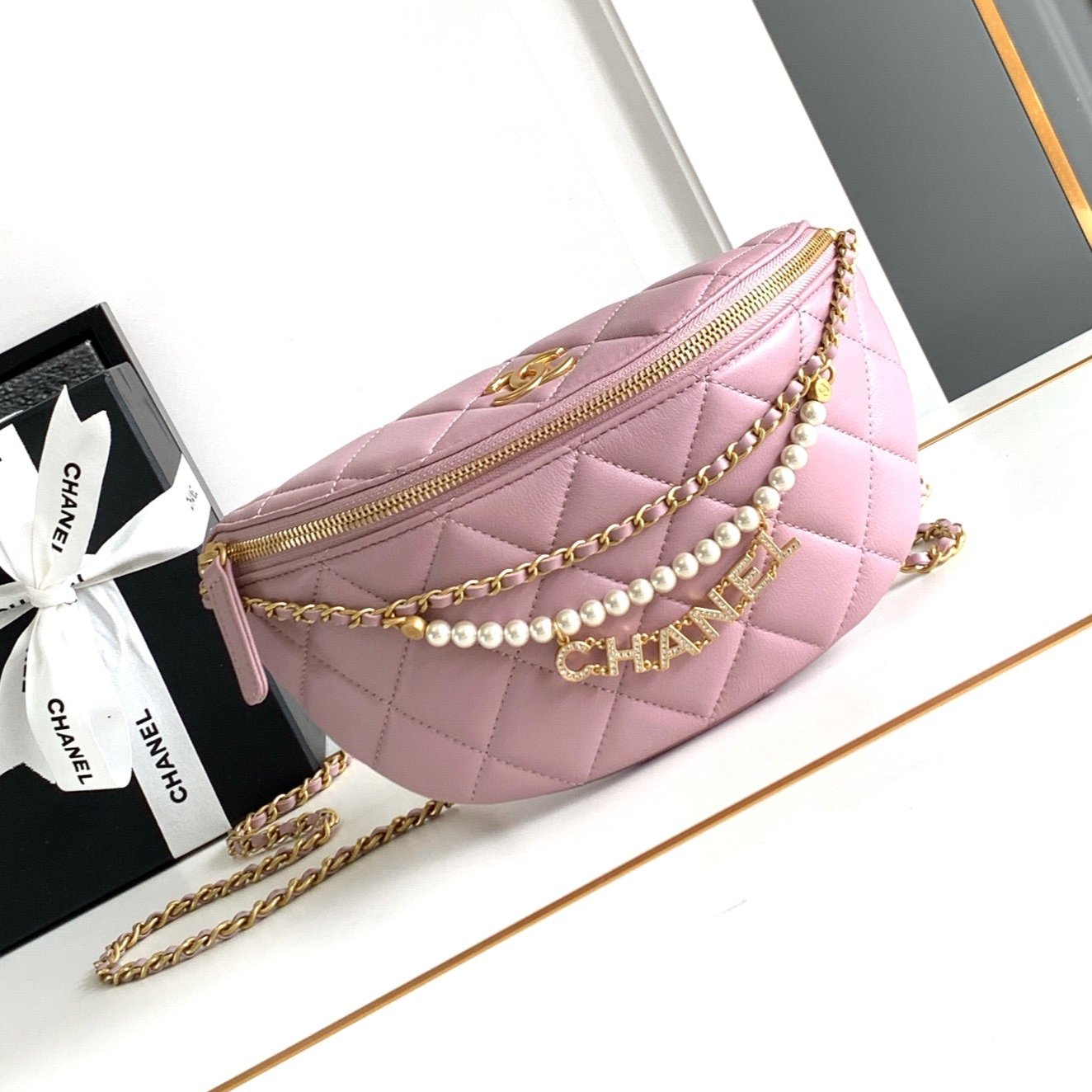 CC WAIST 24 BAG IN LIGHT PINK CALFSKIN WITH PEARL CHAIN AND GOLD HARDWARE